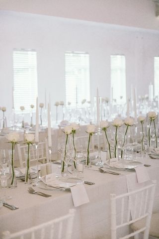 rows of guest tables and white tablecloths 1
