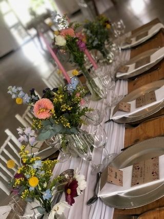 small vases with coloured flowers copy